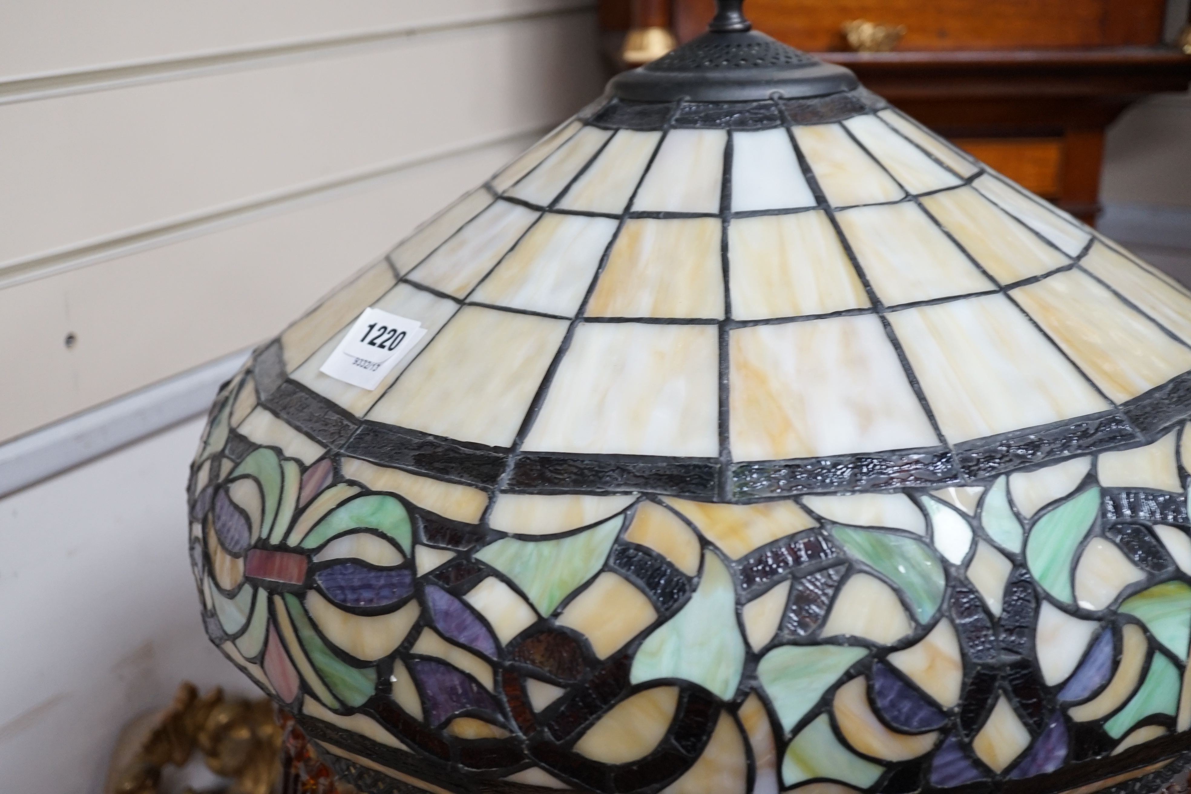 A Tiffany style leaded glass and bronzed metal lamp standard, height 164cm